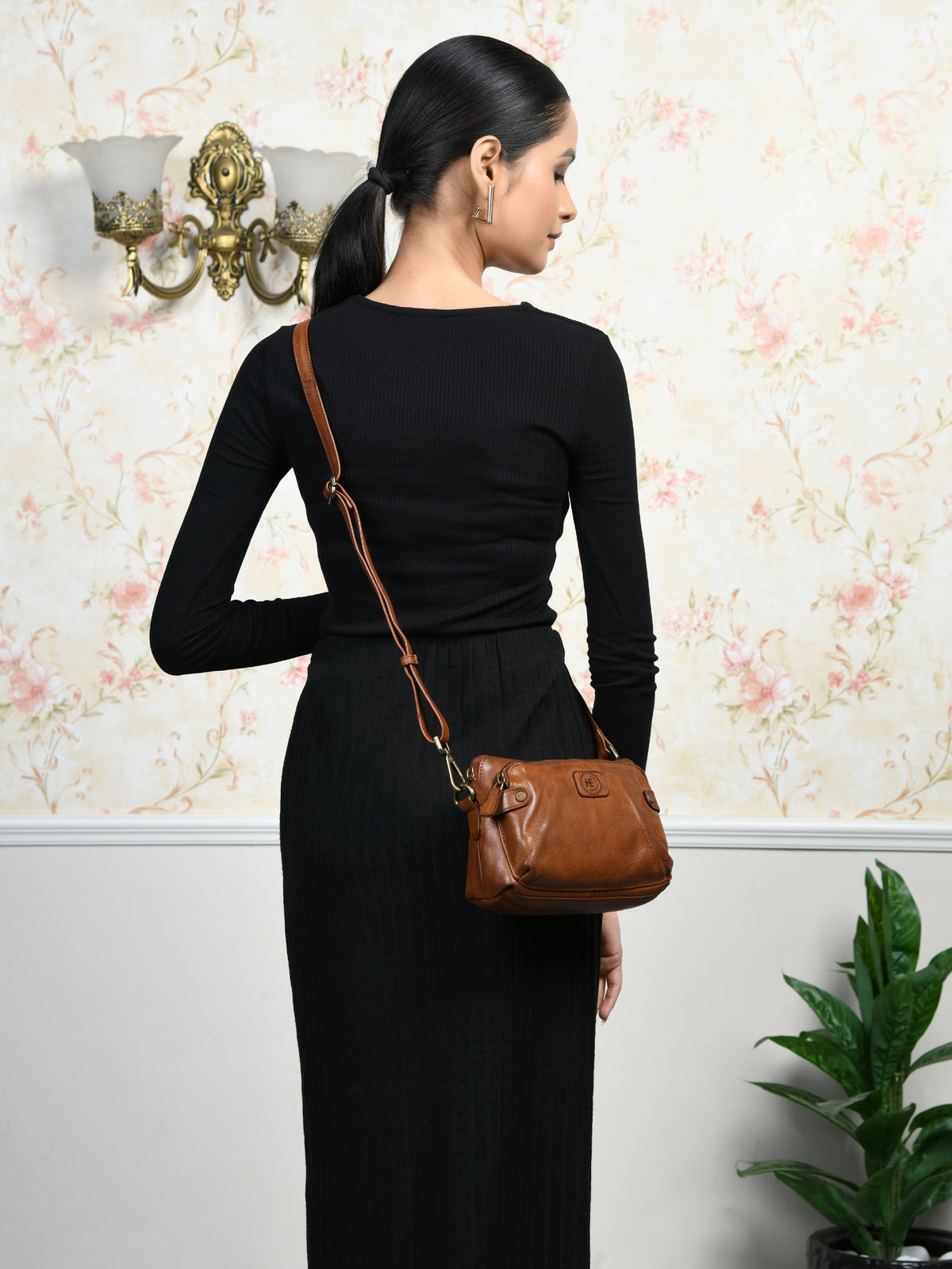 Tan Brown Leather Bag - worn crossbody back view, compact sling style, handcrafted buffalo leather | Hema Emporium
