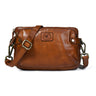 Tan Brown Leather Sling Bag - front view, zip closure, adjustable strap, brass hardware | Hema Emporium