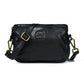Black Leather Sling Bag - front view with zip pockets, brass hardware and adjustable strap, handcrafted buffalo leather | Hema Emporium