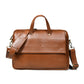 Tan Brown Leather Laptop Bag - front view with top handles, shoulder strap and brass hardware, handcrafted buffalo leather | Hema Emporium