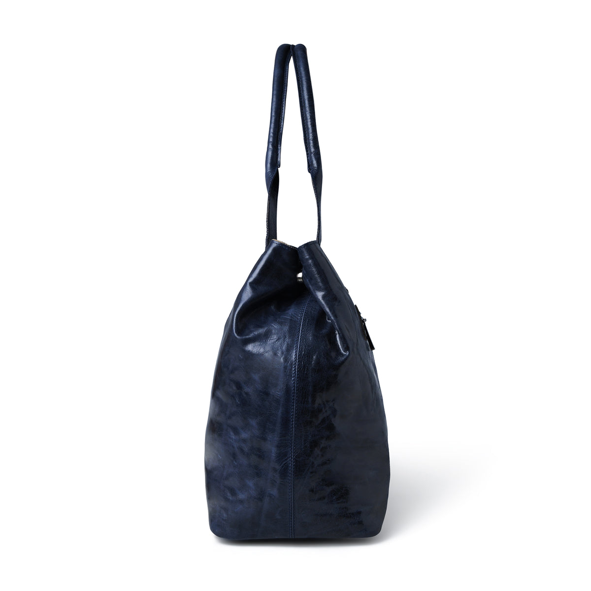 A dark navy textured leather tote bag with dual shoulder straps, shown from a side profile view against a plain white background.