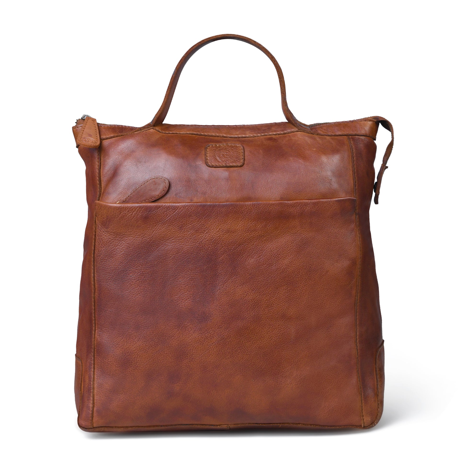 A brown leather tote bag with a top handle, front slip pocket, and a small embossed brand patch, shown on a plain white background.