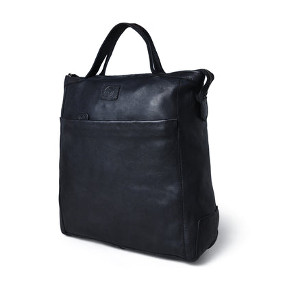 Black leather backpack on a light gray background