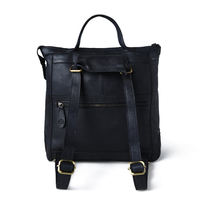 A black leather backpack with top handles and adjustable shoulder straps, shown from the back on a clean white background.