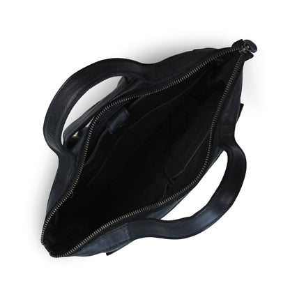 An overhead view of an open black leather handbag, showing the interior lining and zipper closure against a plain white background.