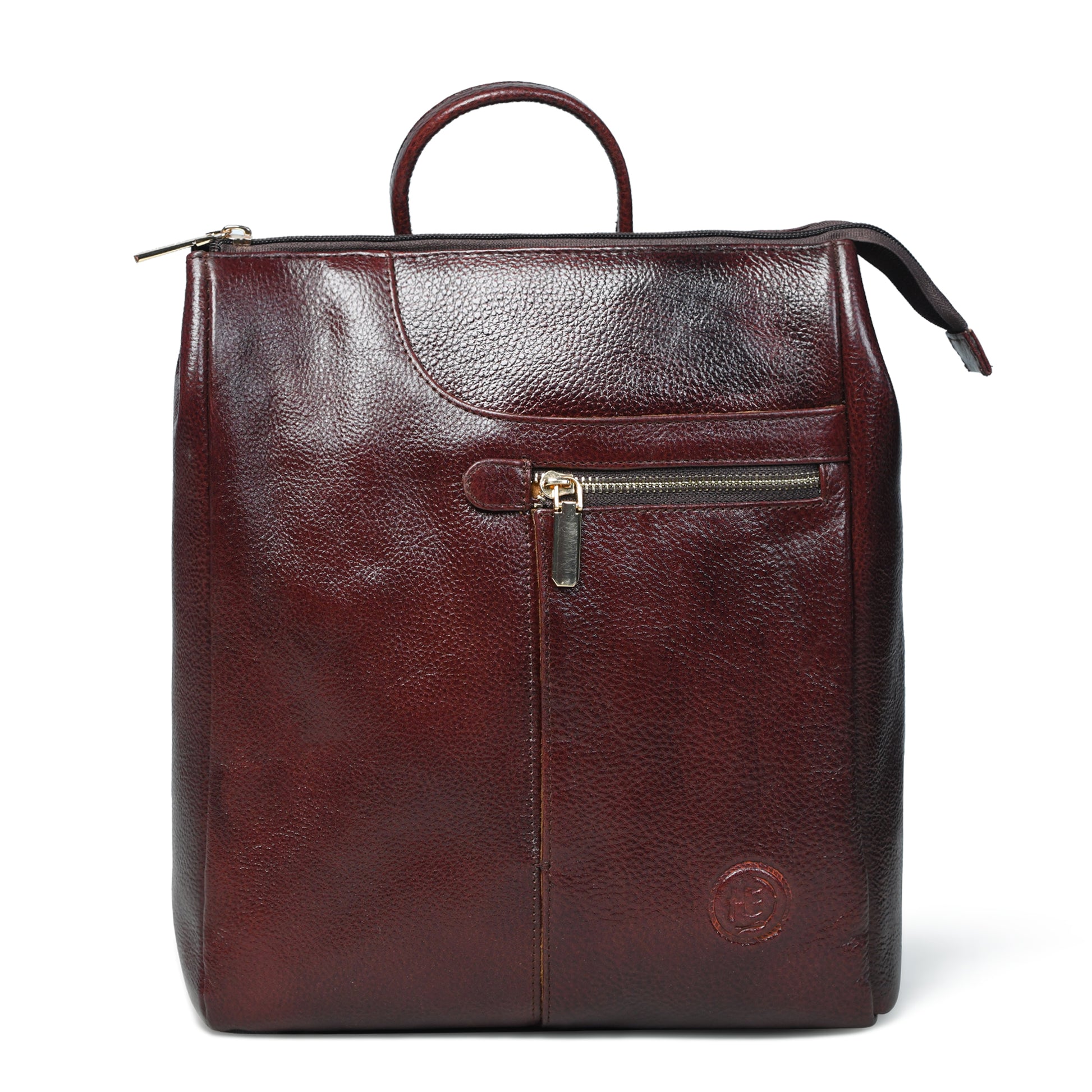 A burgundy leather backpack with a top handle, a front zippered pocket, and a circular embossed logo on the lower right, shown against a plain white background.