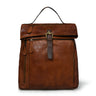 Tan brown leather bag - front view with buckle and zipper details, handcrafted buffalo leather | Hema Emporium