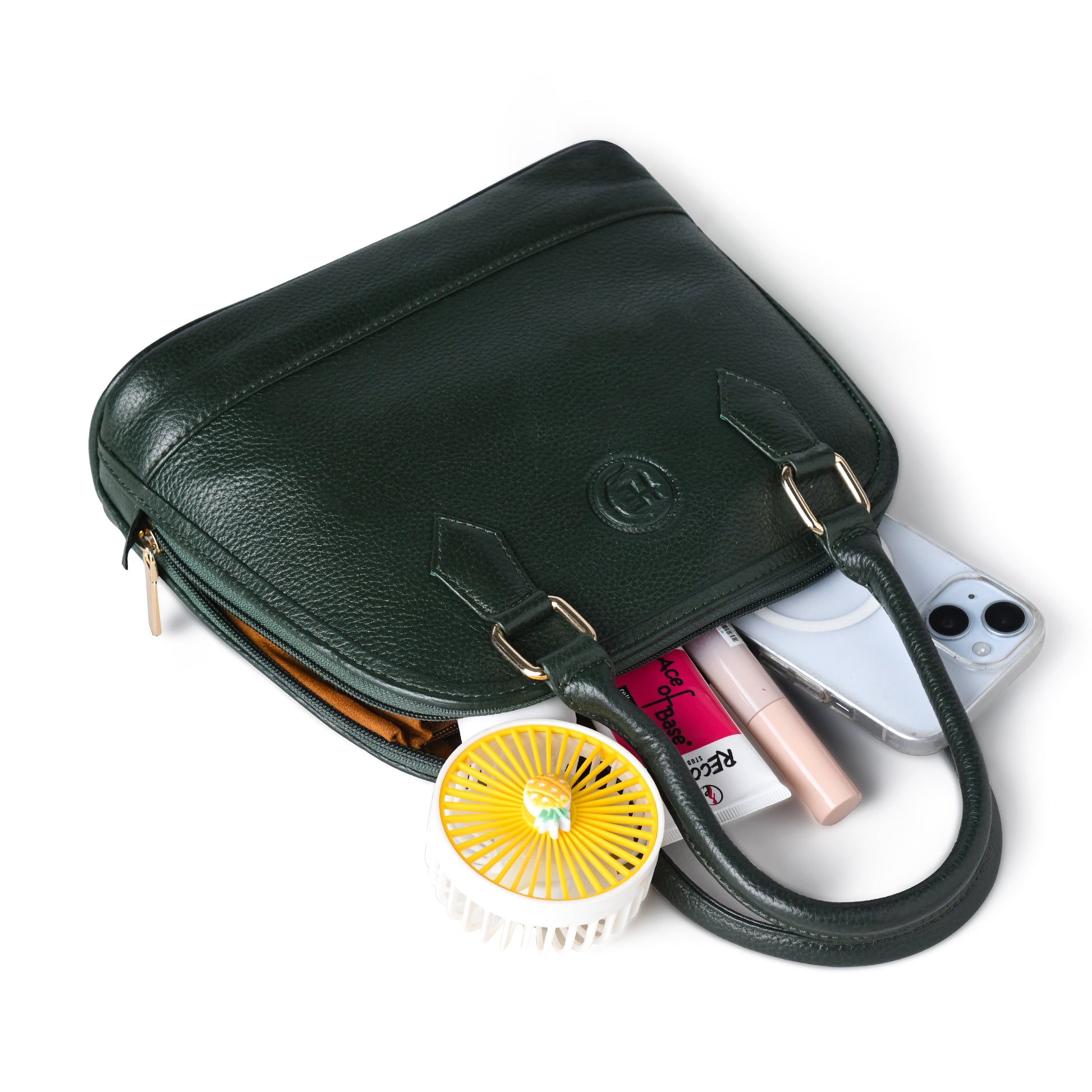 Forest Green leather bag - interior view with personal items, handcrafted buffalo leather | Hema Emporium