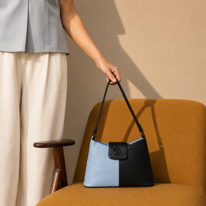 Sky Blue & Black Leather Shoulder Bag - worn lifestyle shot, handcrafted buffalo leather | Hema Emporium